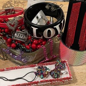 Heart shaped dish filled with fun jewelry